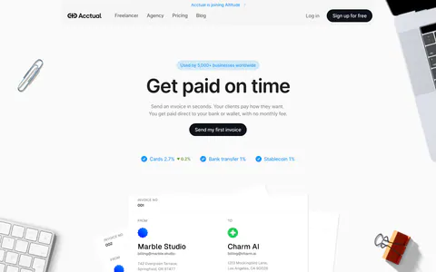 Acctual hero section: centered headline, CTA and fee checklist above an invoice mockup framed by desk objects on light gray
