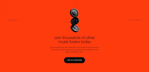 EchoFi call-to-action section: stacked black 3D coins above a centered headline and community button on bright orange