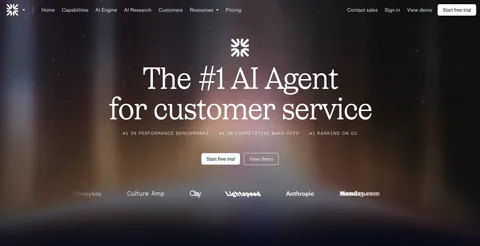 Fin hero section: nav bar, centered serif headline, ranking labels and CTAs over a dark aurora glow with a customer logo row