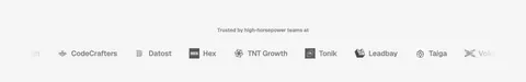 Ploy logo cloud section: small centered caption above a single row of grayscale customer logos fading at the edges on light gray