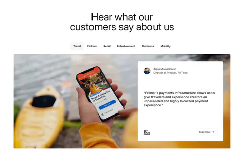Primer testimonials section: centered headline, industry tabs, and a quote card over a photo of a hand holding a phone