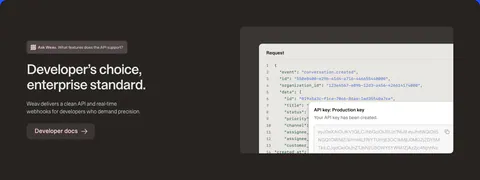 Weav features section: dark brown band with headline and docs button on the left and a JSON request code block with an API key popup